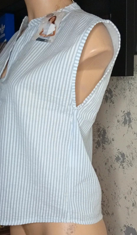 Blusa sin mangas rayas azul y blanco