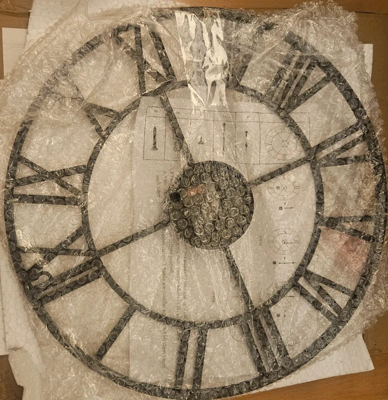 Reloj de pared redondo metal negro calado