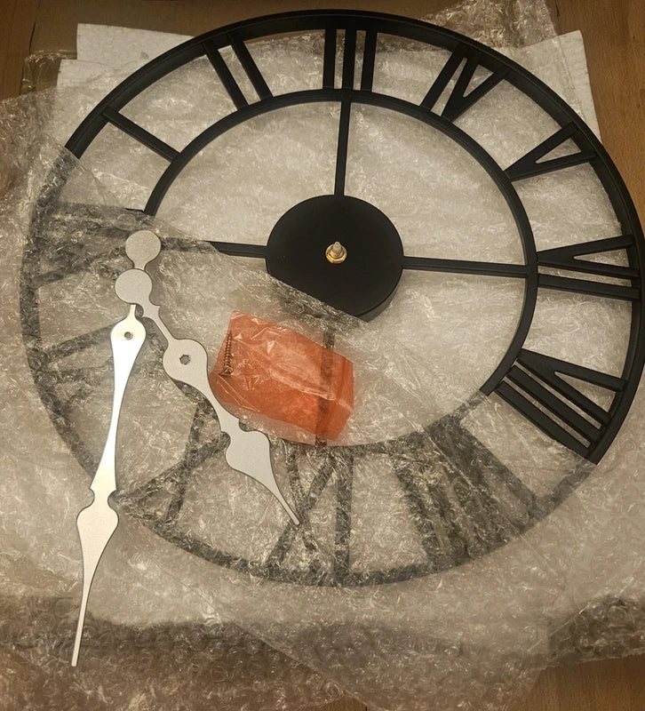 Reloj de pared redondo metal negro calado