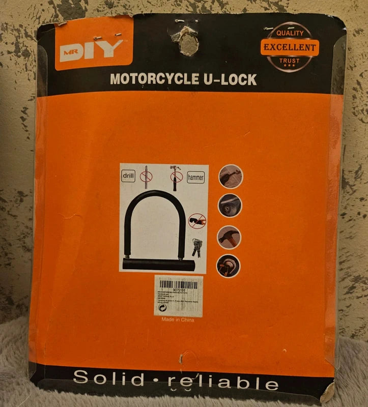 Candado U Alta Seguridad Antirrobo - Color naranja. - Incluye dos llaves.