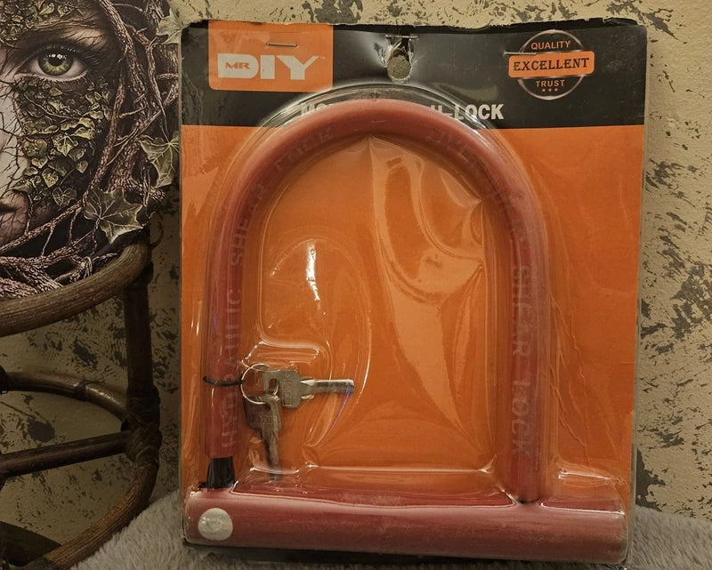 Candado U Alta Seguridad Antirrobo - Color naranja. - Incluye dos llaves.