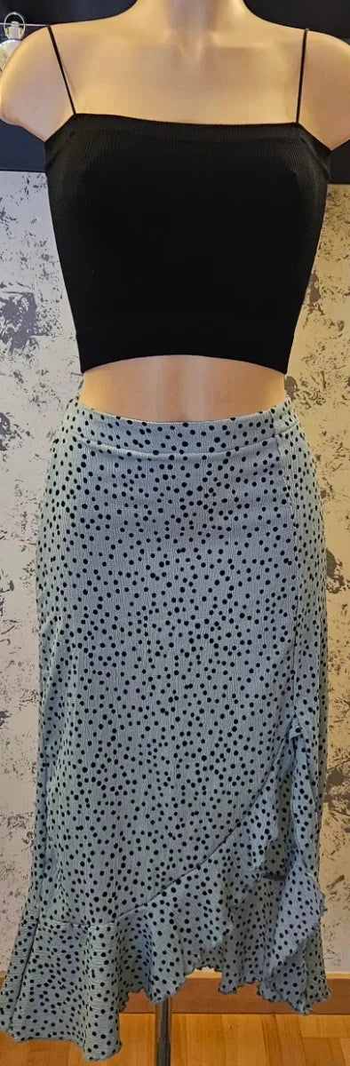 Falda midi verde agua con lunares negros