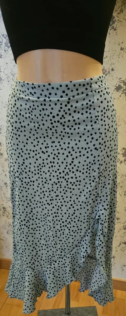 Falda midi verde agua con lunares negros