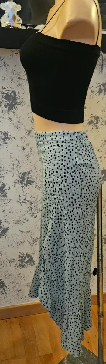 Falda midi verde agua con lunares negros