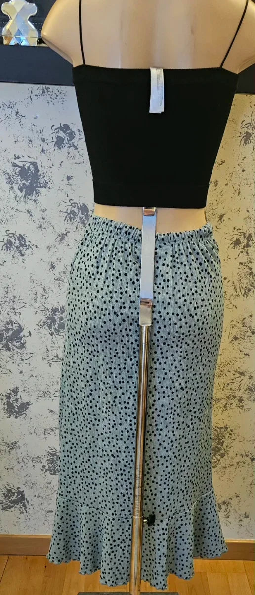 Falda midi verde agua con lunares negros